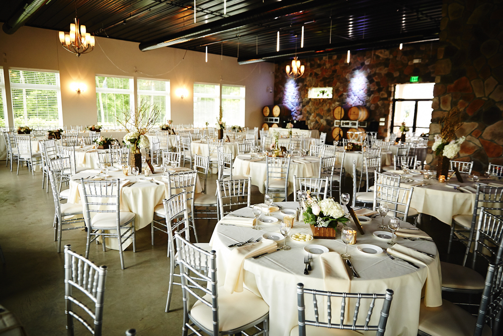 Venue:  Winehaven Winery and Vineyard  | Photography:  Justin Mark Photography  | Videography:  Virtuoso Video Productions  | Hair: Kari Kranston at  Mask Hair Design | Make-Up:  Karen Wagner  | Ceremony and Social Hour Music :  Hanson &amp; Hoyt | Dinner/Reception DJ:  Instant Request  | Catering :  Mintahoe Catering &amp; Events | Late Night Snack:  Pizza Man  | Photobooth:  The Traveling Photo Booth  | Officiant:  Cristopher (Cris) Anderson  | Florist:  Bloom by Design | Transportation:  Mary Ann’s Tours  &amp;  Stillwater Trolley