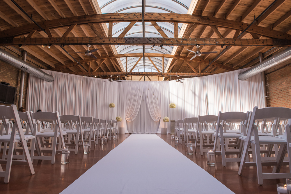 Venue:   Loft on Lake   | Photography:   Thara Photo   | Planning:   Elisa  , The Simply Elegant Group | Draping:   Art of Imagination   | Floral:     Gratitude Heart Garden   | Catering:   FireFly   | Cake:   West Town Bakery   | Bar:   Binny's   | Reception:   Toast & Jam  Transportation:   Windy City Limo