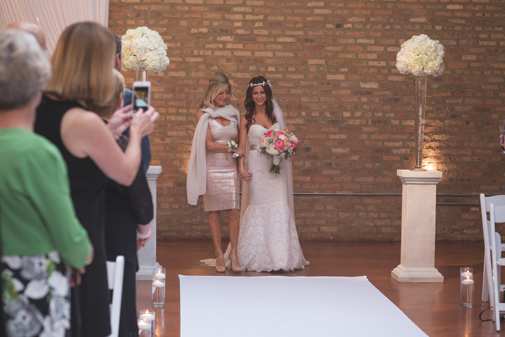 Venue:  Loft on Lake  | Photography:  Thara Photo  | Planning:  Elisa , The Simply Elegant Group | Draping:  Art of Imagination  | Floral:    Gratitude Heart Garden  | Catering:  FireFly  | Cake:  West Town Bakery  | Bar:  Binny's  | Reception:  Toast & Jam Transportation:  Windy City Limo