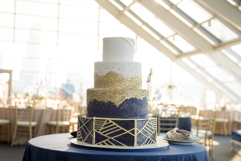 Photographer:  Gerber+Scarpelli Photography  | Ceremony:  Old Saint Pats  | Reception:  Adler Planetarium  | Planner: Simply Elegant Group,  Elisa  | Catering:  Food for Thought Catering  | Hair/Makeup:  Elena Denning  | Decor:  Revel Decor  | Cake:  Alliance Bakery   | Live Music:  TVK Orchestra