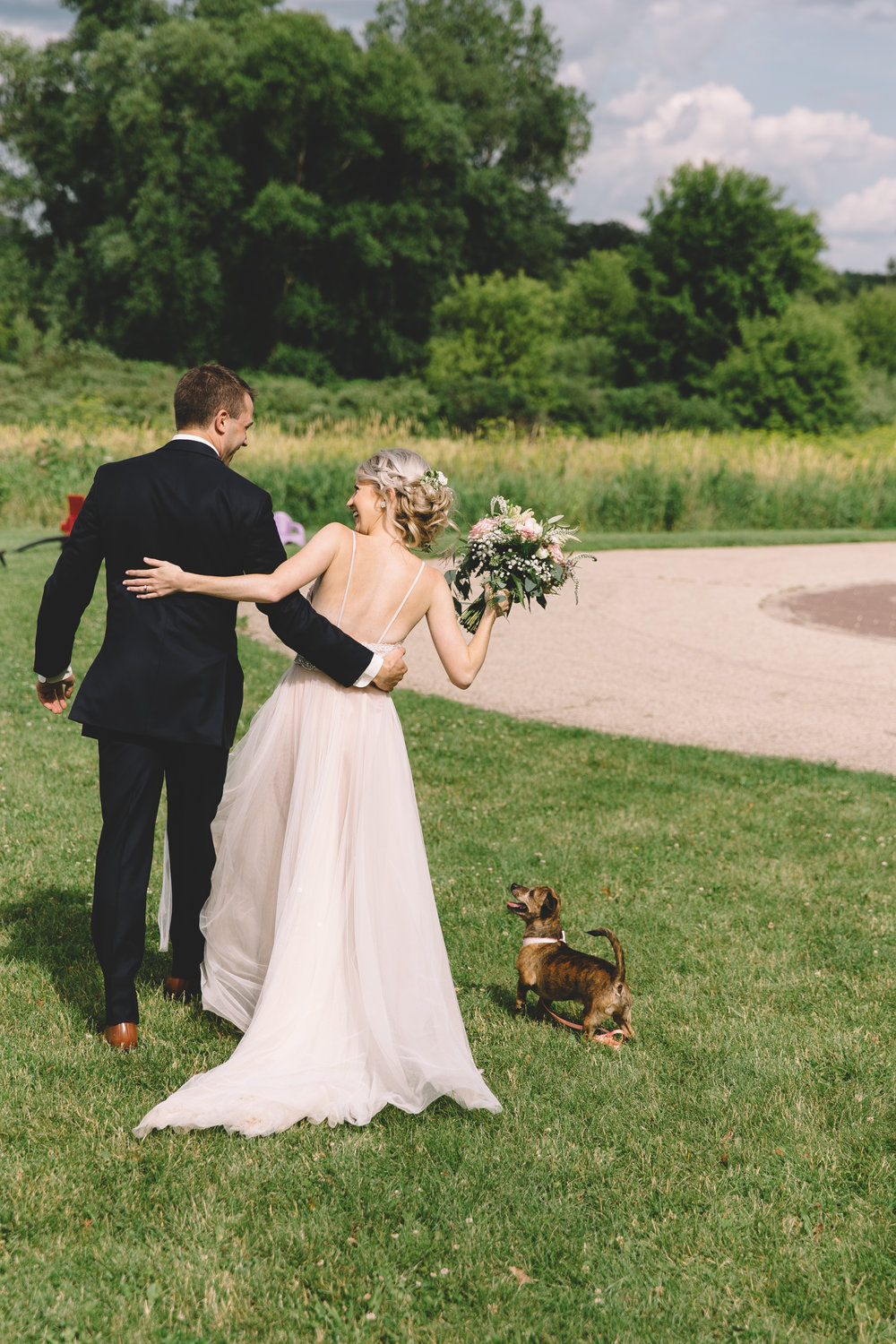 outdoor wedding portrait with dog