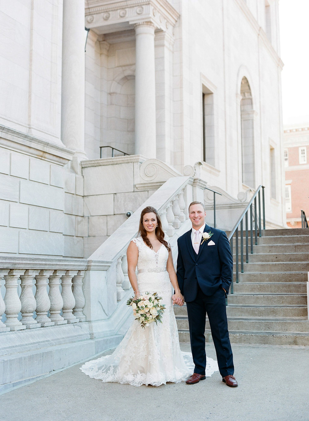 Bride and groom outside their wedding at the Landmark Center in St Paul