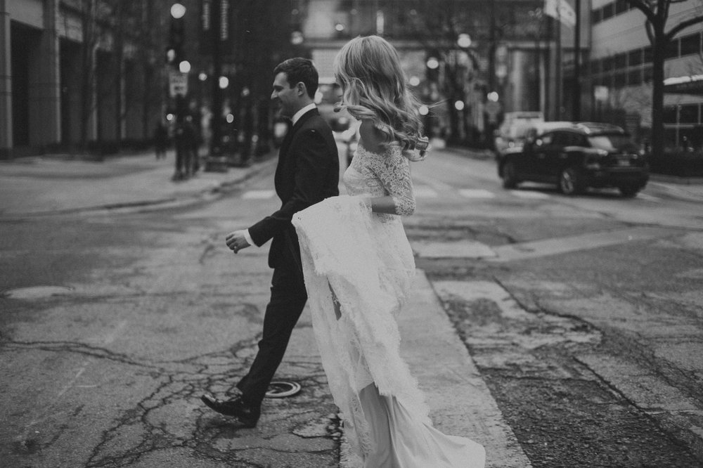 Bride and groom walking the streets of Chicago