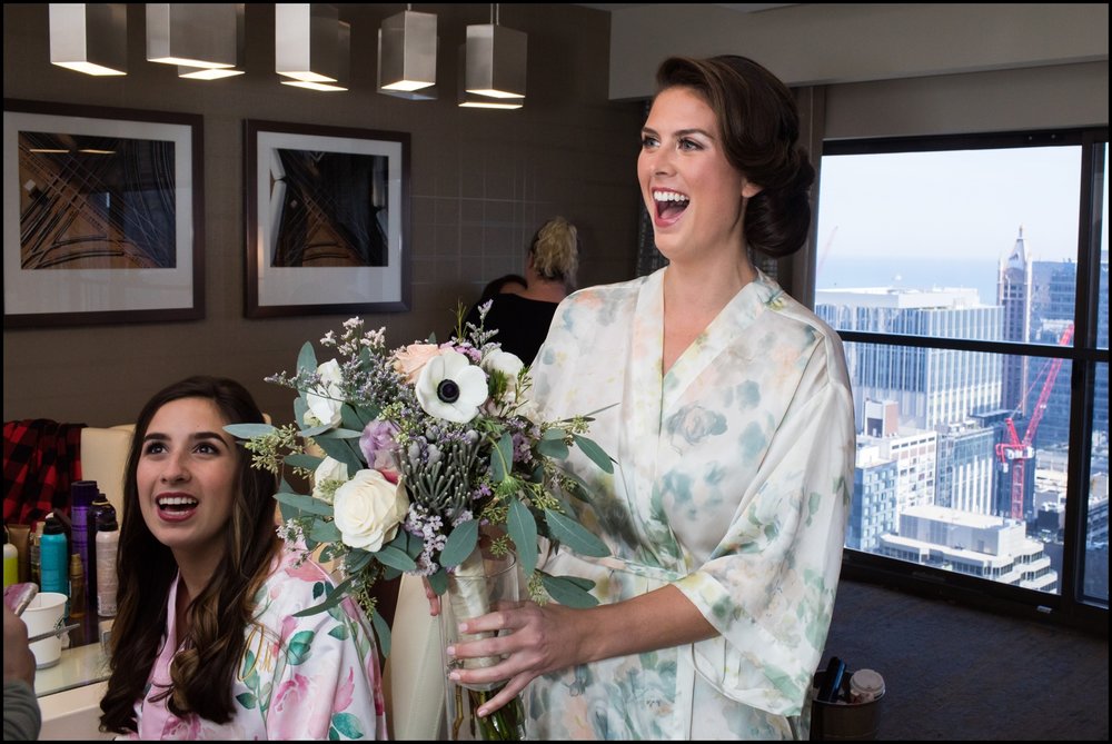  bride getting ready with her bridesmaids 