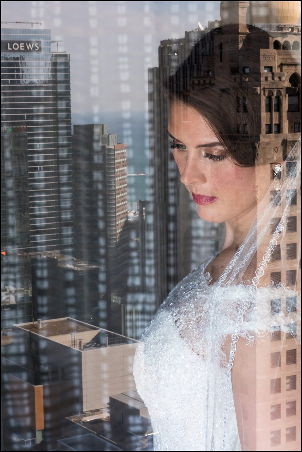  bride looking out at the city view of Chicago 
