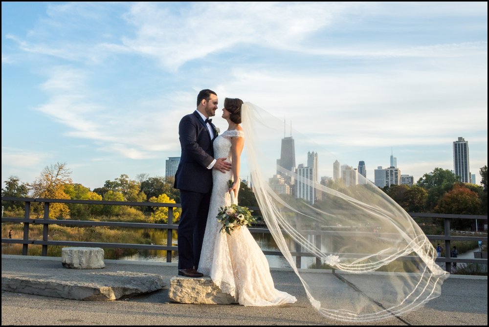Bride and groom on the Chicago skyline