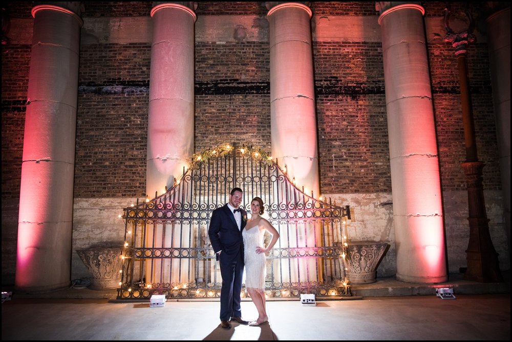 Bride and groom outside Architectural Artifacts