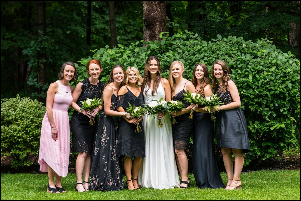  bridesmaids holding bouquets 