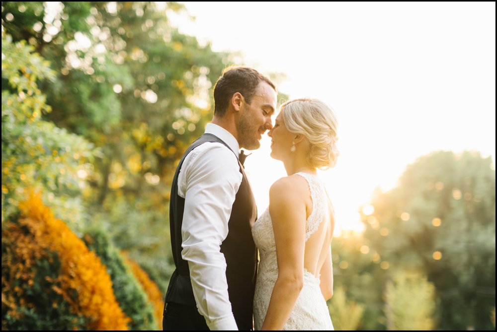  bride and groom in the sunset at Hutton House 