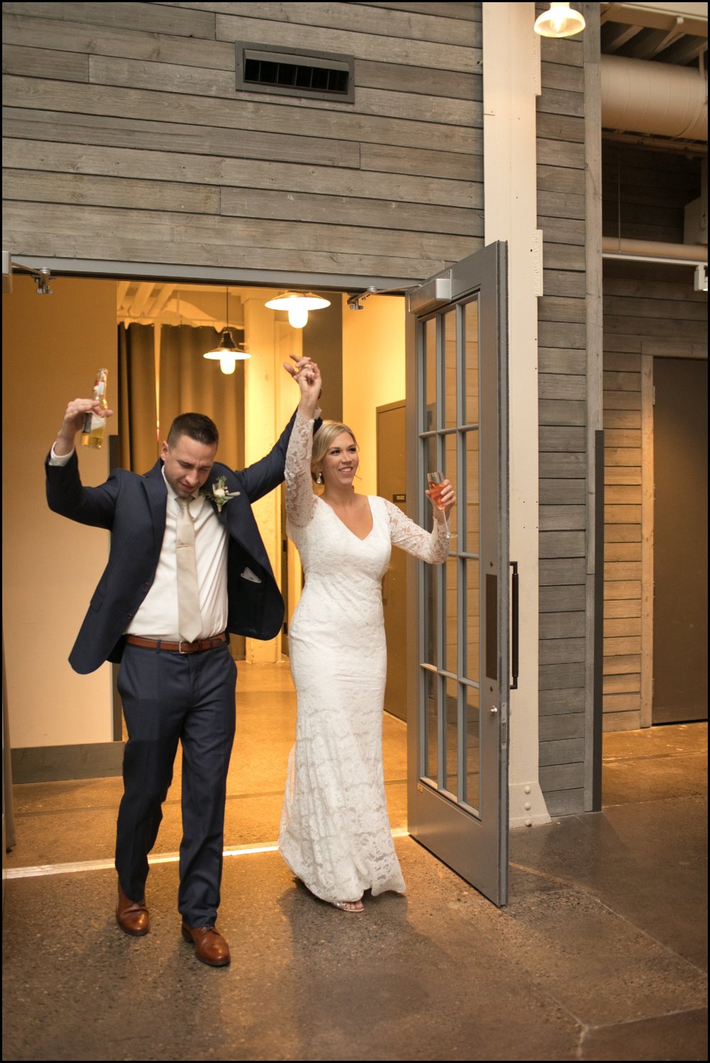  Bride and groom entering the reception 