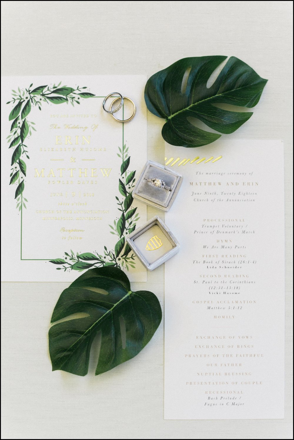  wedding invitation and wedding ring   