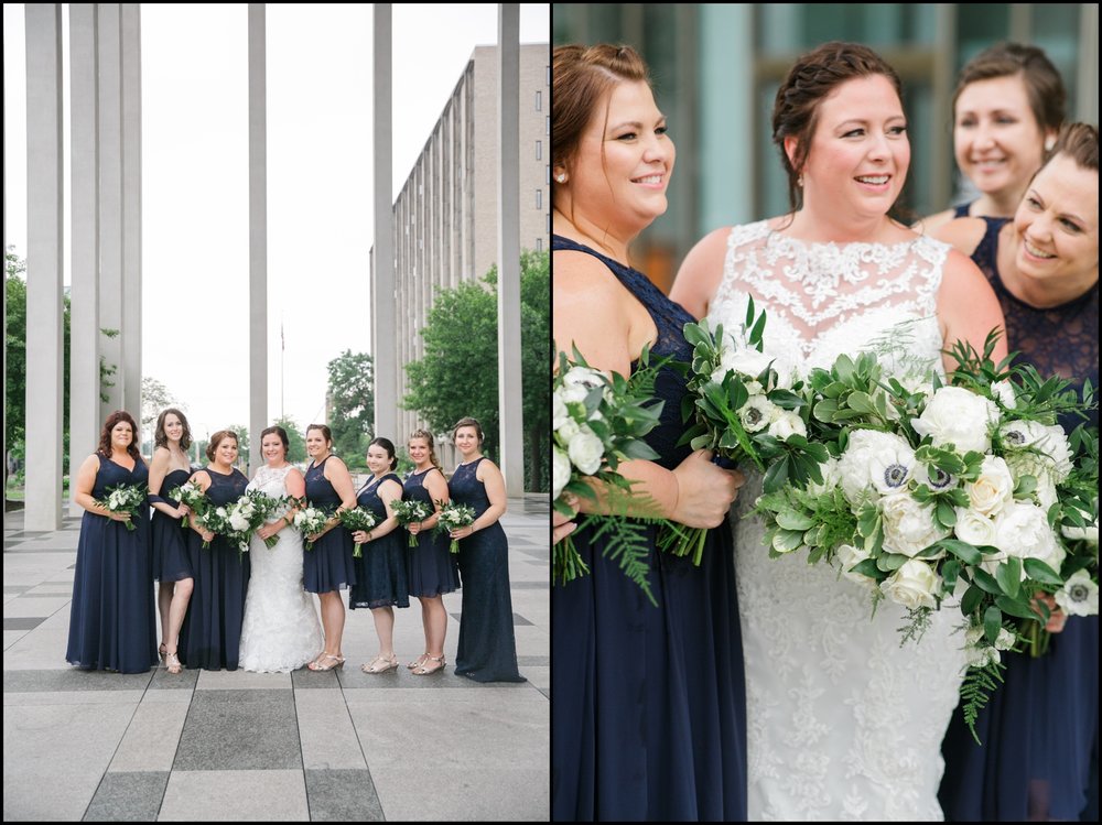  bridesmaids wearing navy blue dresses 