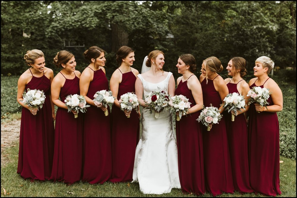  Bridesmaids and the bride with their wedding bouquets 