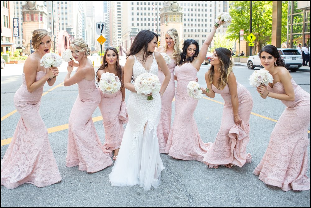  Bride and bridesmaids dancing 