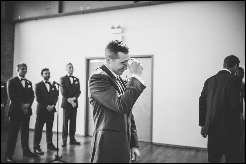  Groom tearing up as the bride walks down the aisle  