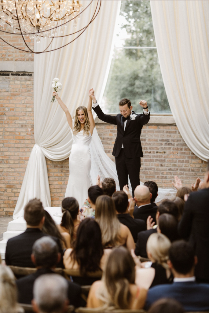 Bride and Groom celebrating after wedding ceremony