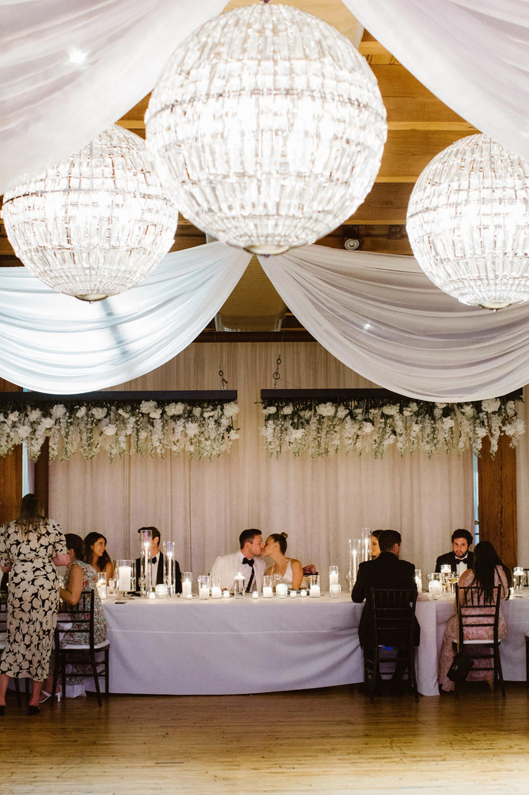 Bride and groom at wedding reception in the Skyline Loft venue in Bridgeport Art Center Chicago