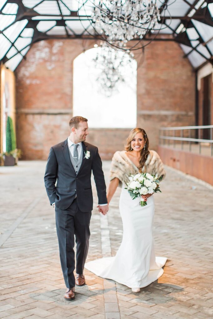 Bridgeport Art Center wedding couple in the Sculpture Garden after winter ceremony