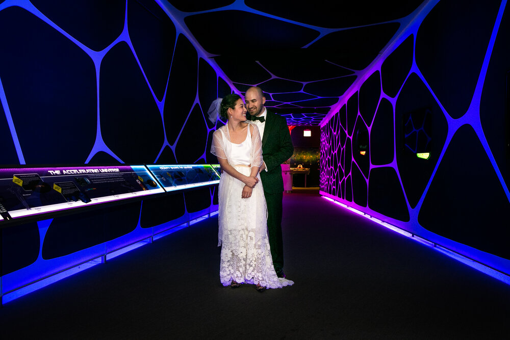 Bride and groom at Adler Planetarium exhibit
