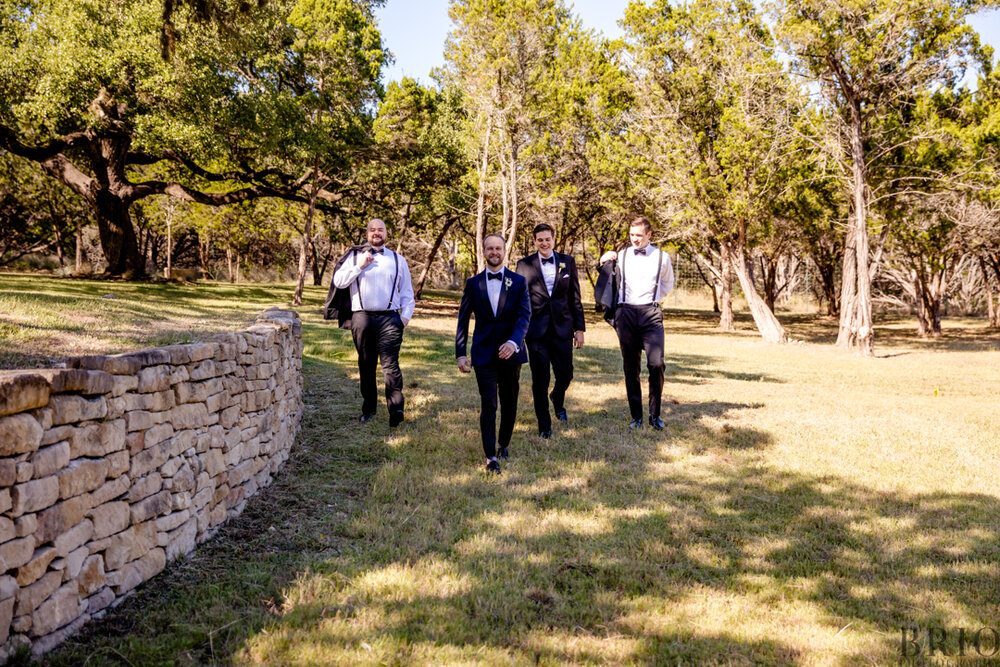 Groomsmen outdoors at ivory oak wedding