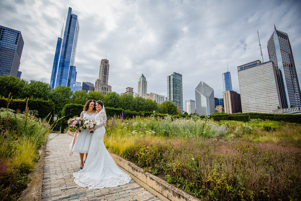 two brides in garden in downtown Chicago
