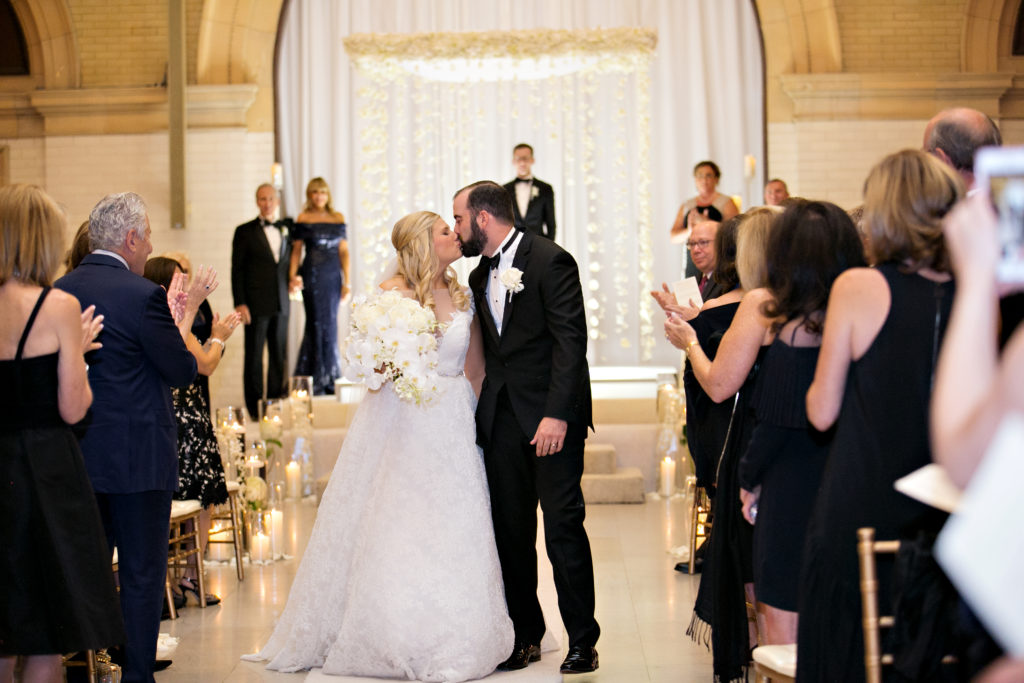 Bride and Groom Kiss at the Renaissance Minneapolis Hotel, The Depot