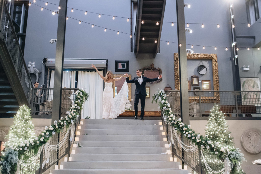 Couple makes an entrance at Artifacts Chicago wedding reception