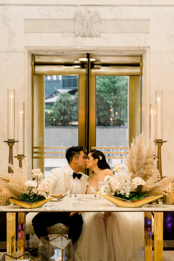 Bride and groom kissing during their The Old Post Office Chicago wedding reception