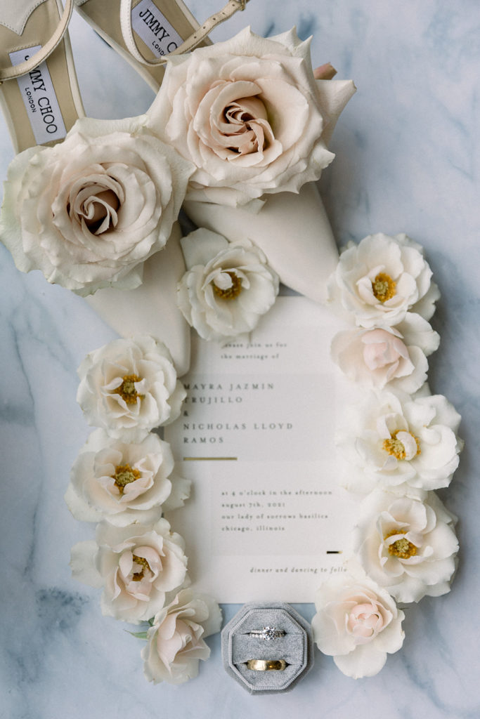 The Old Post Office Chicago wedding invitation, flowers and rings