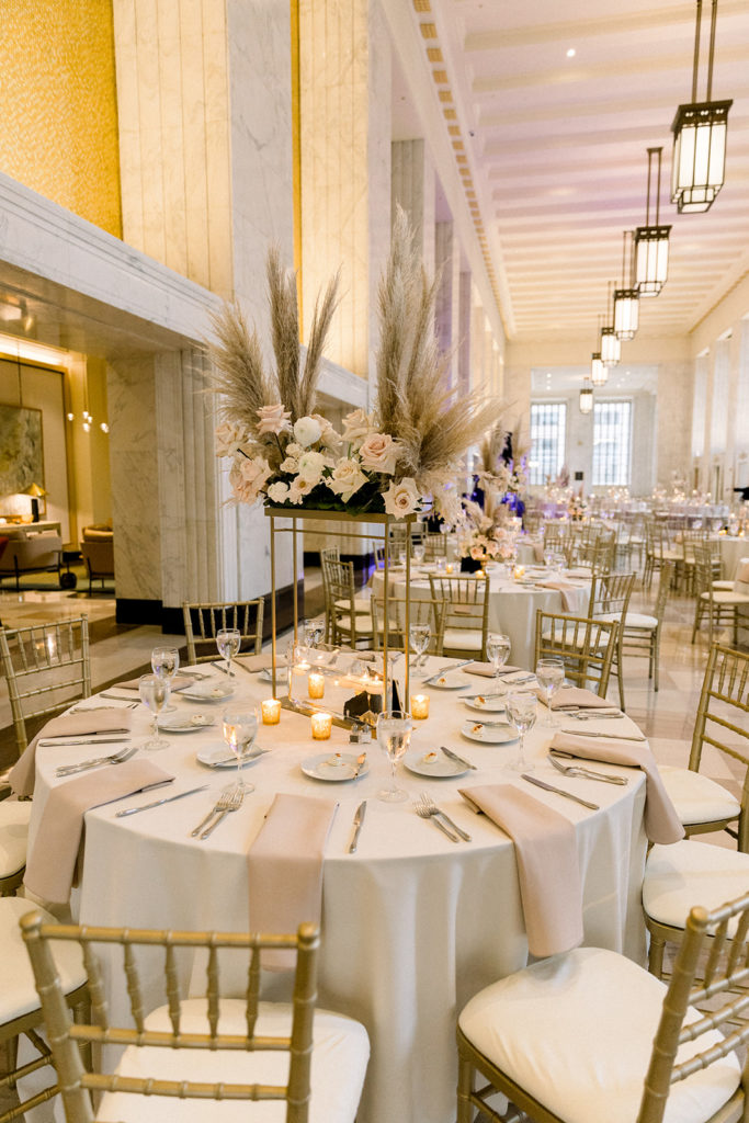 The Old Post Office Chicago wedding tables with florals from Kehoe Designs