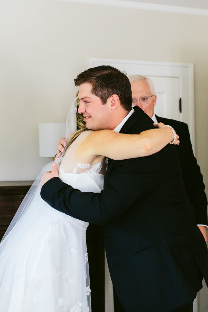 Bride hugging a family member