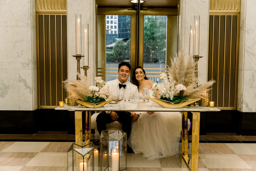Smiling bride and groom at The Old Post Office of Chicago wedding venue