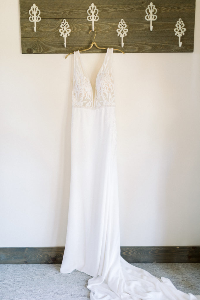 Wedding dress hanging at The Barn at Stoney Hills