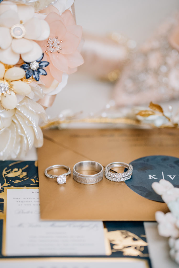Wedding ring and invitation photo by Chicago wedding photographers