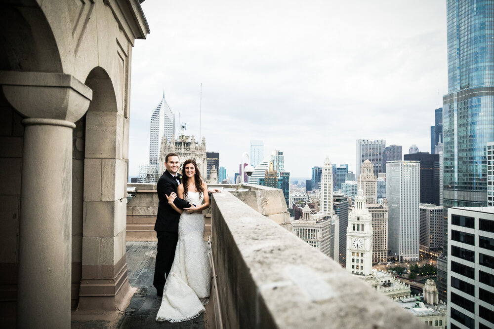 Bride and groom on Intercontinental Chicago rooftop with skyline views