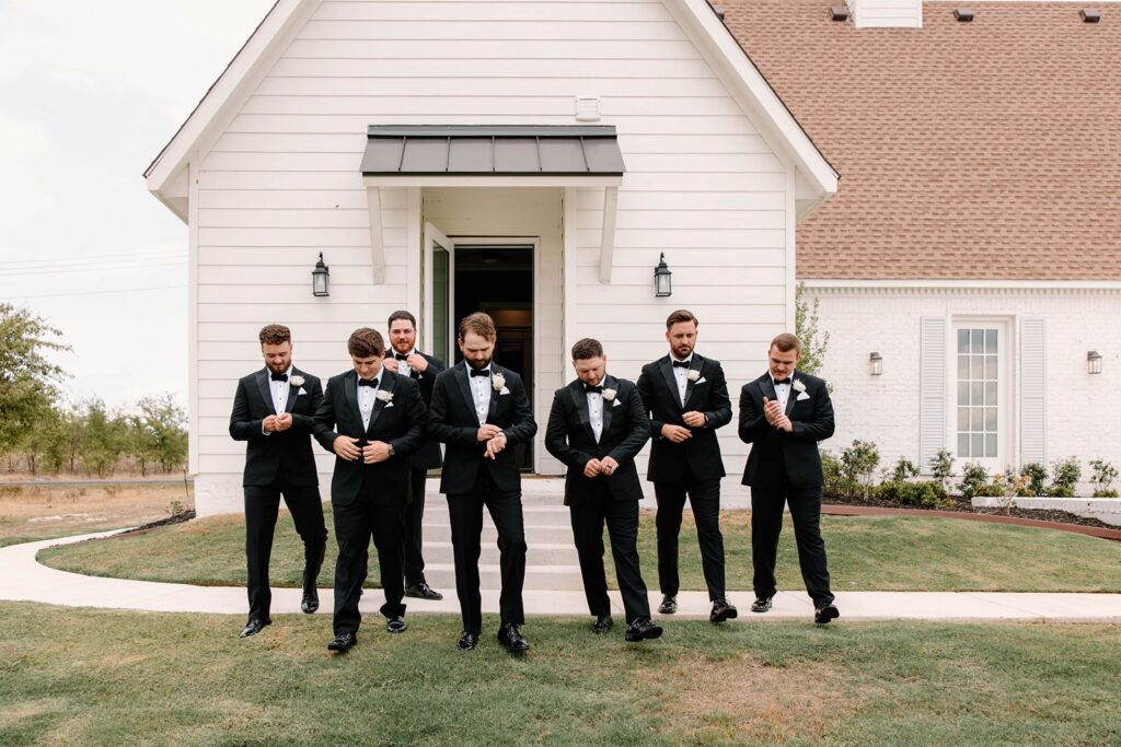 Groomsmen walking to ceremony