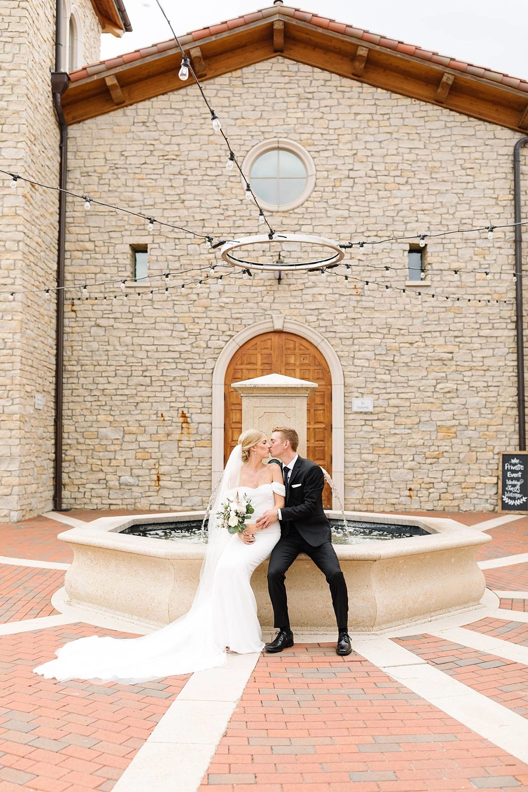 wedding couple on the piazza at Villa Bellezza Winery