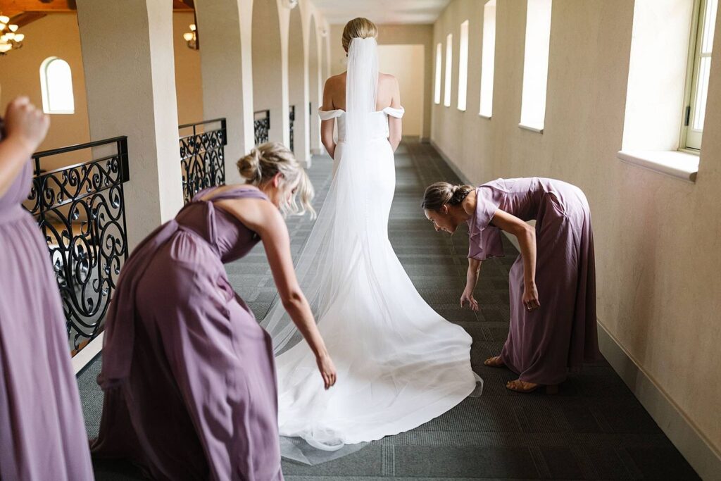 Final wedding day touches by bridesmaids