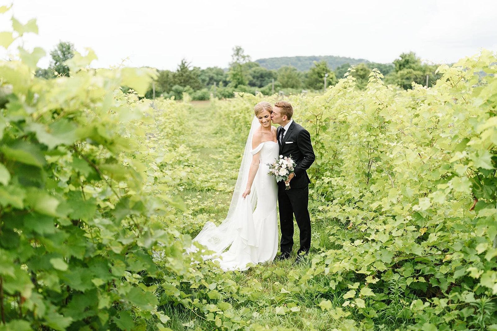 Villa Belleza Winery wedding couple in the vineyard