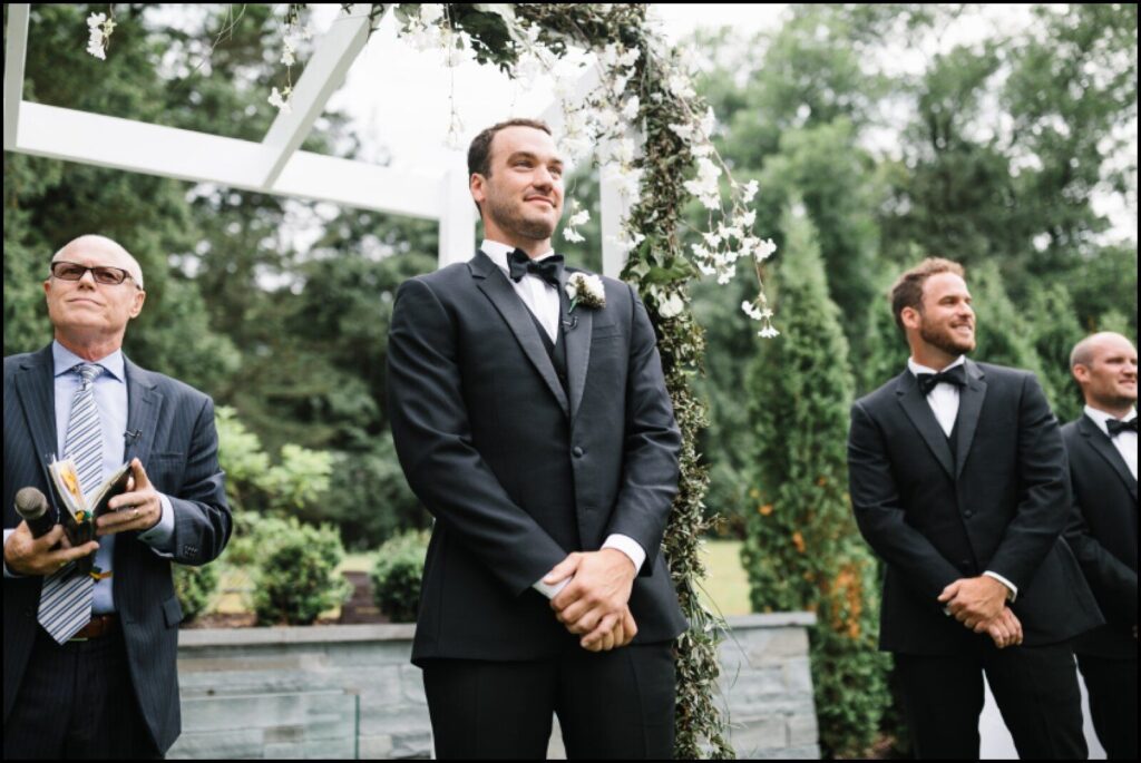 Groom waiting for his bride to come down the aisle