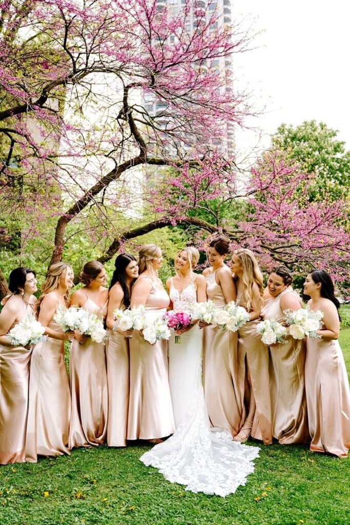 Bridal party posed outside Dallas hotel wedding venue